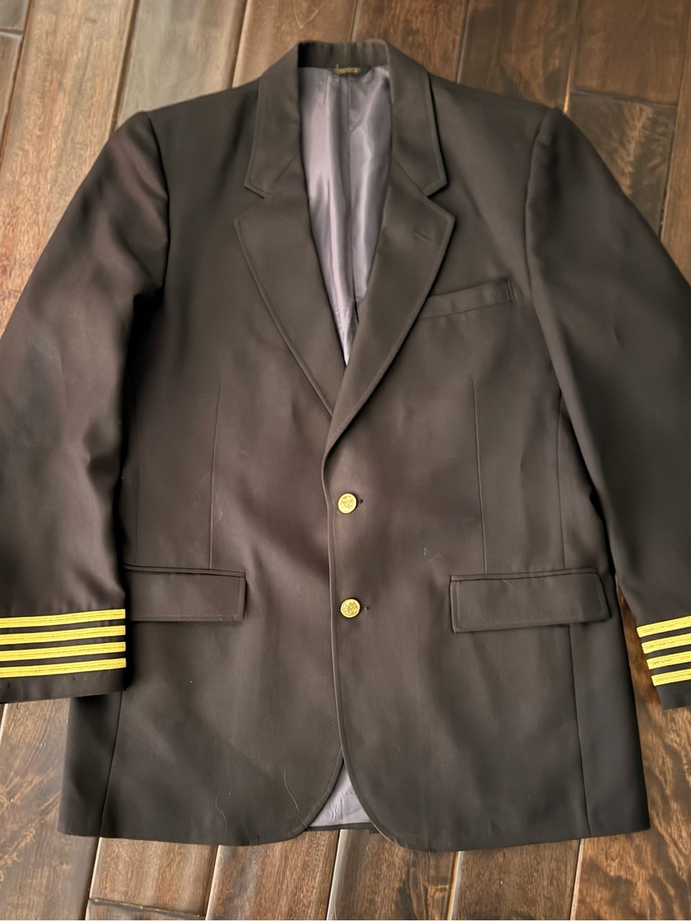 Vintage captain uniform jacket. 4 stripes on sleeves. Waterbury buttons.42 long